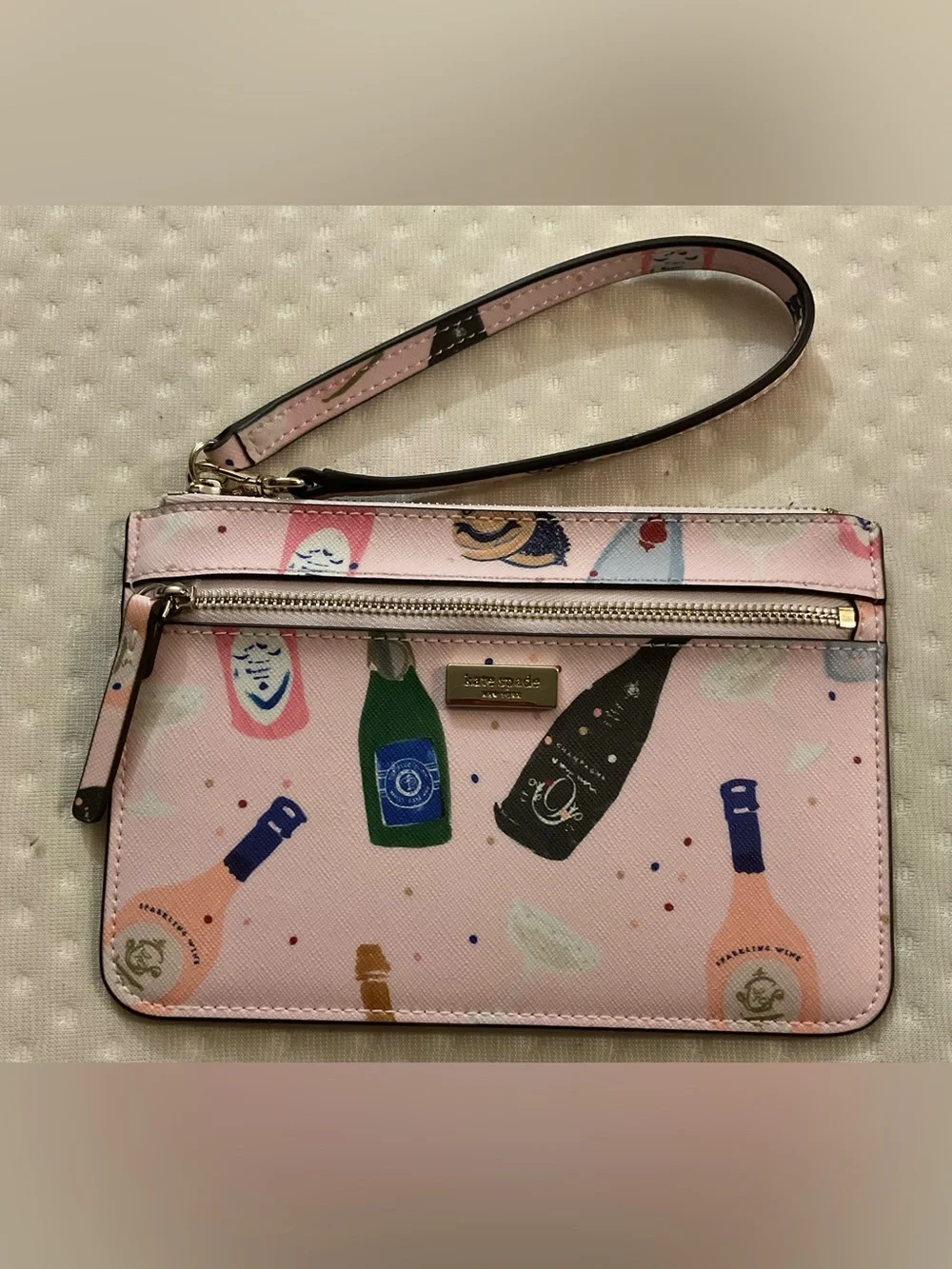 kate spade Pink Champagne Bottle Print Wristlet